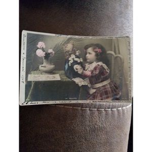 Vintage Postcard RPPC Little Dutch Girl With Baby Flowers La Poupee 1906 Address